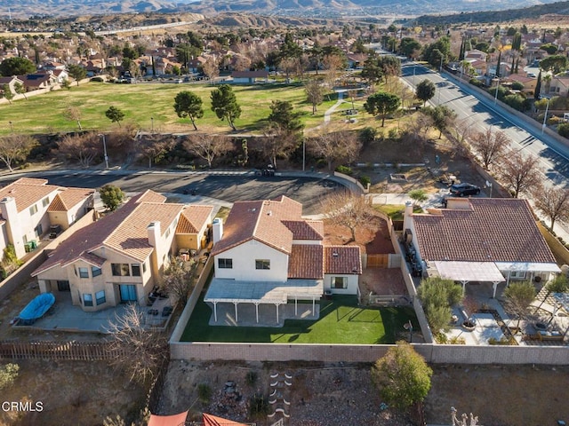 drone / aerial view featuring a mountain view