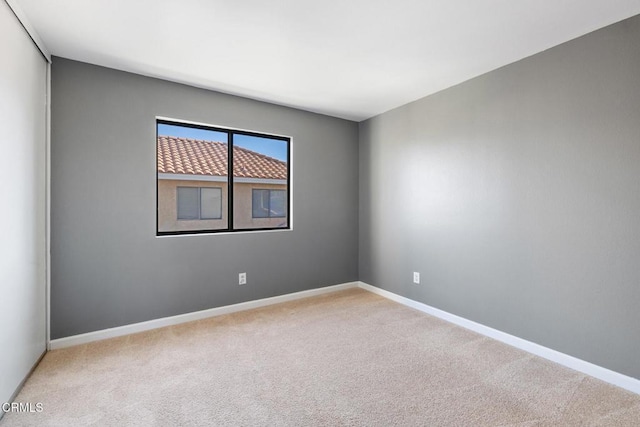 empty room featuring carpet floors