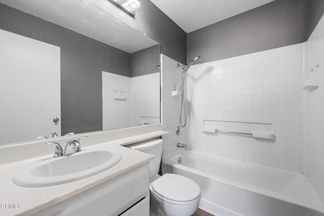 full bathroom featuring toilet, vanity, and shower / tub combination