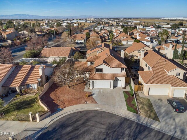 drone / aerial view featuring a mountain view