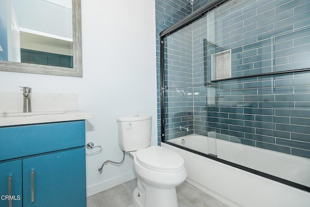 full bathroom with toilet, vanity, shower / bath combination with glass door, and tile patterned flooring