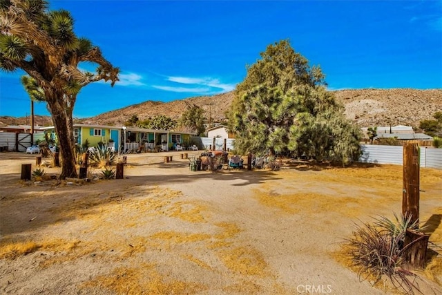 exterior space featuring a mountain view