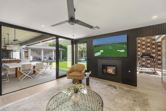 sunroom / solarium with ceiling fan