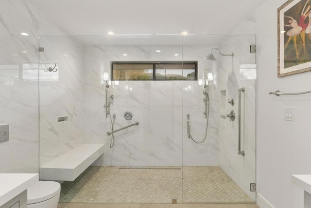 bathroom with toilet, vanity, tile patterned floors, and a shower with door