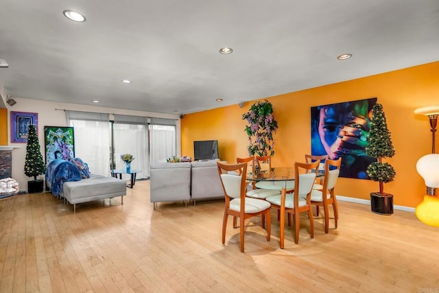 dining room with light wood-type flooring