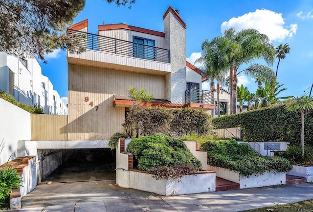 exterior space with a balcony