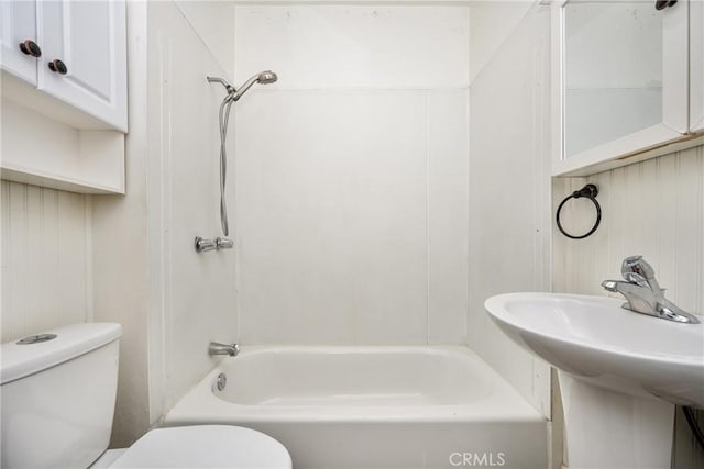 full bathroom featuring toilet, shower / bath combination, and sink