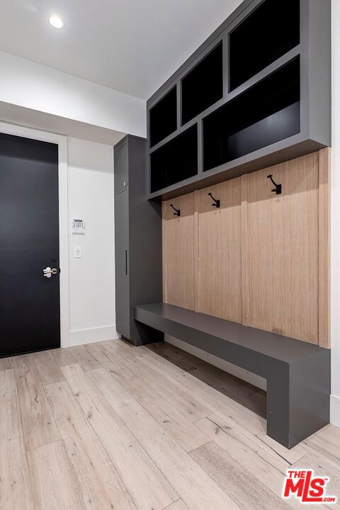 mudroom with light wood-type flooring