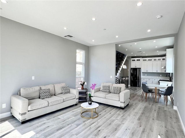 living room featuring light hardwood / wood-style flooring