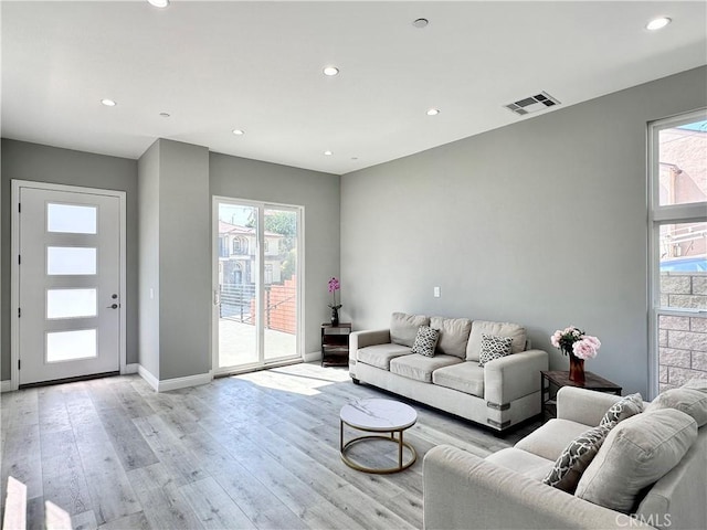 living room featuring light wood-type flooring