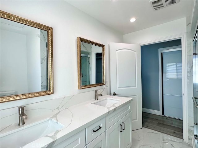 bathroom featuring vanity