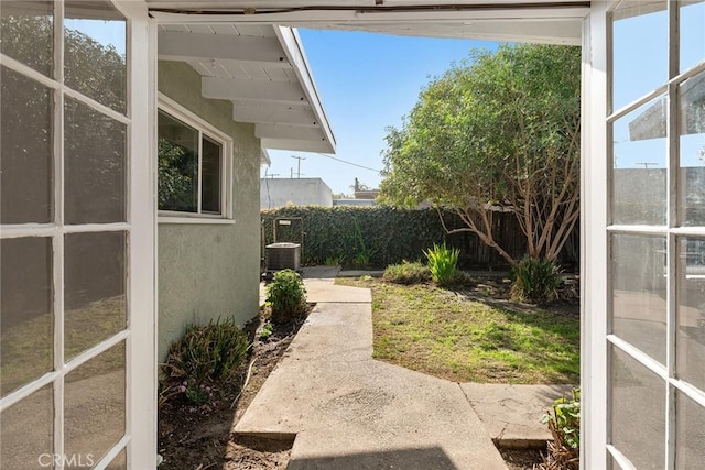 view of yard featuring central AC