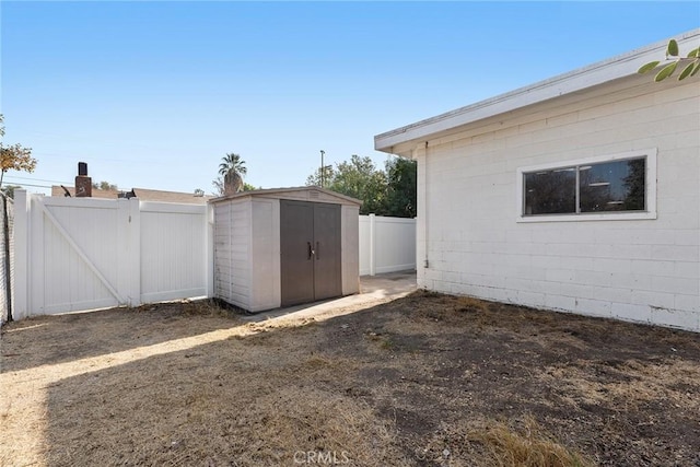 exterior space featuring a storage unit