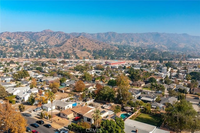 drone / aerial view featuring a mountain view