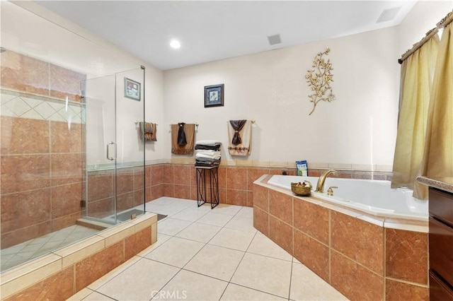 bathroom featuring plus walk in shower and tile patterned flooring