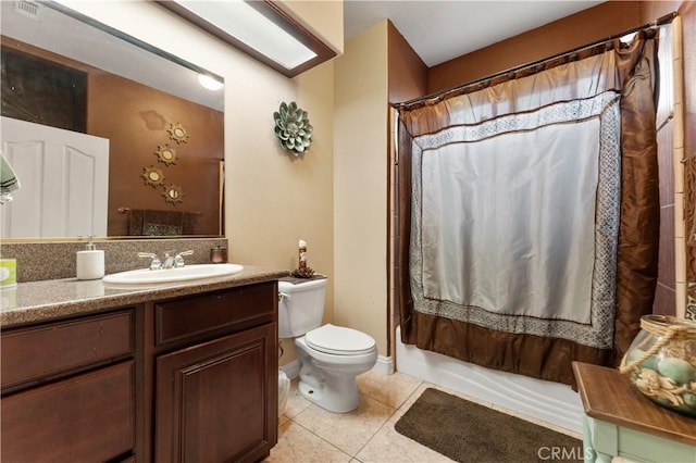 full bathroom with toilet, tile patterned flooring, shower / tub combo, and vanity