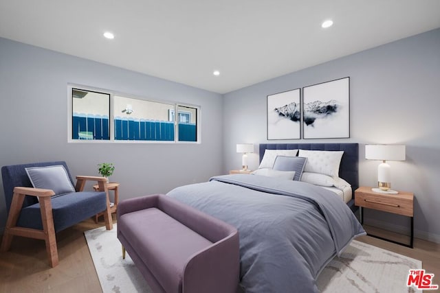 bedroom featuring light hardwood / wood-style flooring