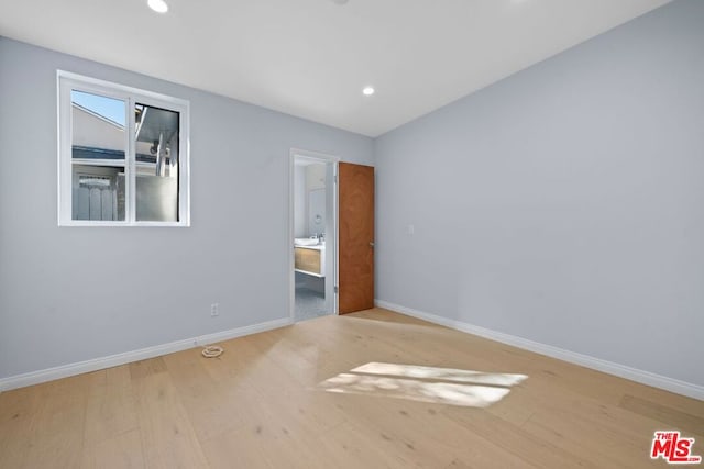 unfurnished bedroom featuring light hardwood / wood-style floors