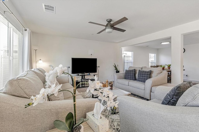 living room featuring ceiling fan