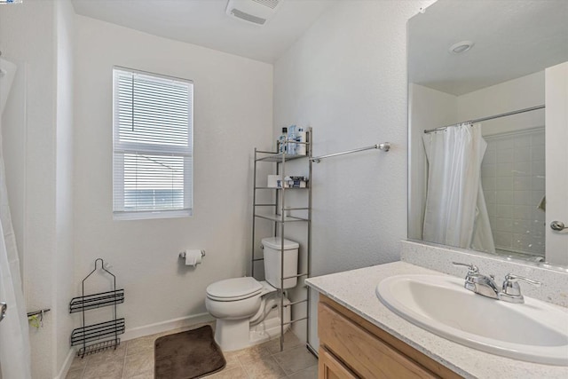 bathroom featuring tile patterned floors, toilet, vanity, and a shower with curtain