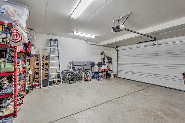 garage featuring a garage door opener