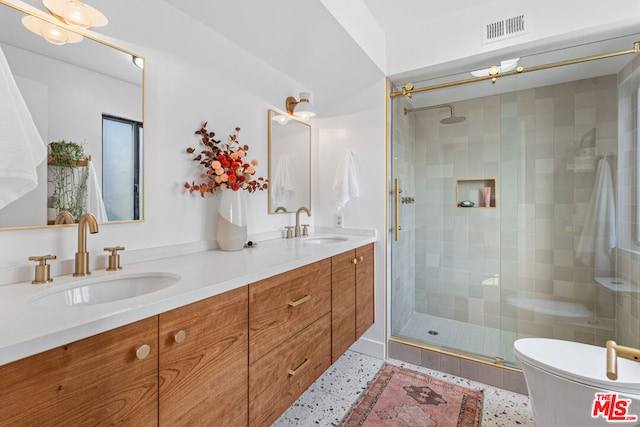 bathroom featuring walk in shower, vanity, and toilet