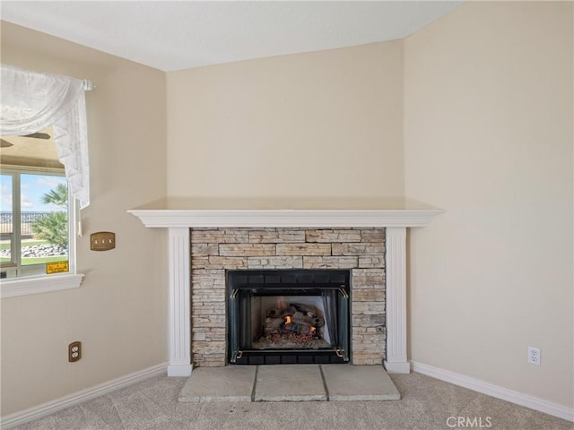 room details featuring carpet and a fireplace