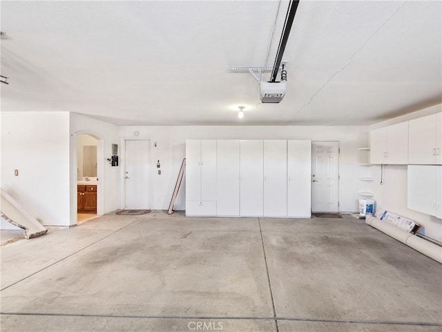 garage featuring a garage door opener