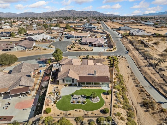 drone / aerial view featuring a mountain view