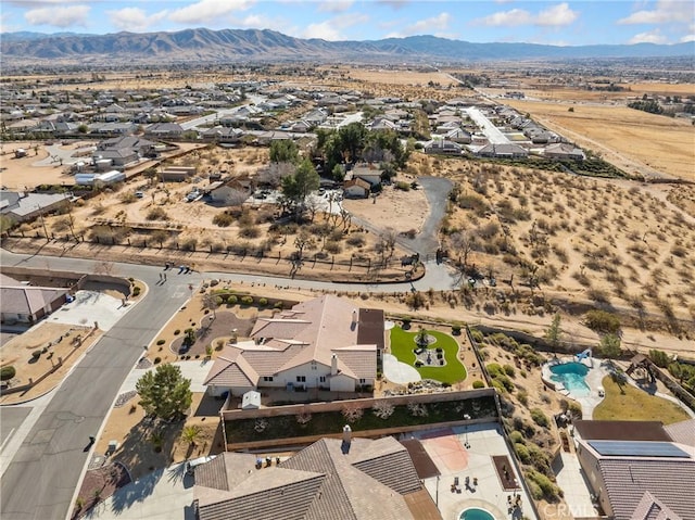 bird's eye view with a mountain view