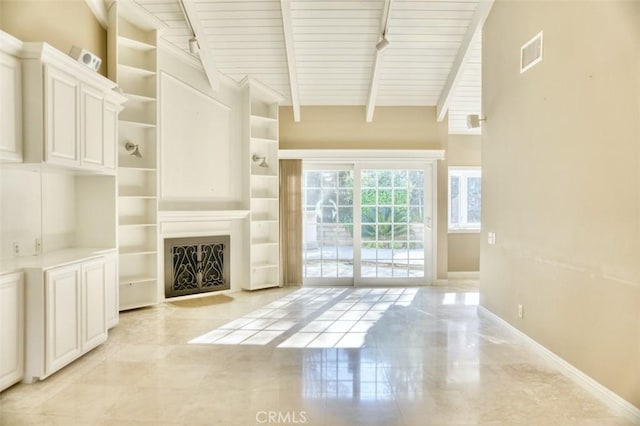 unfurnished living room with wood ceiling and beamed ceiling