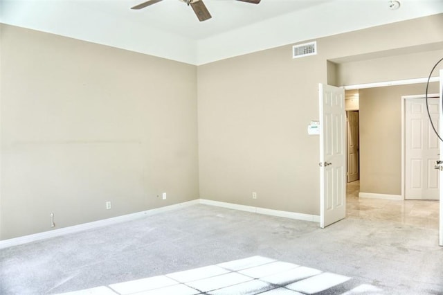 carpeted empty room with ceiling fan