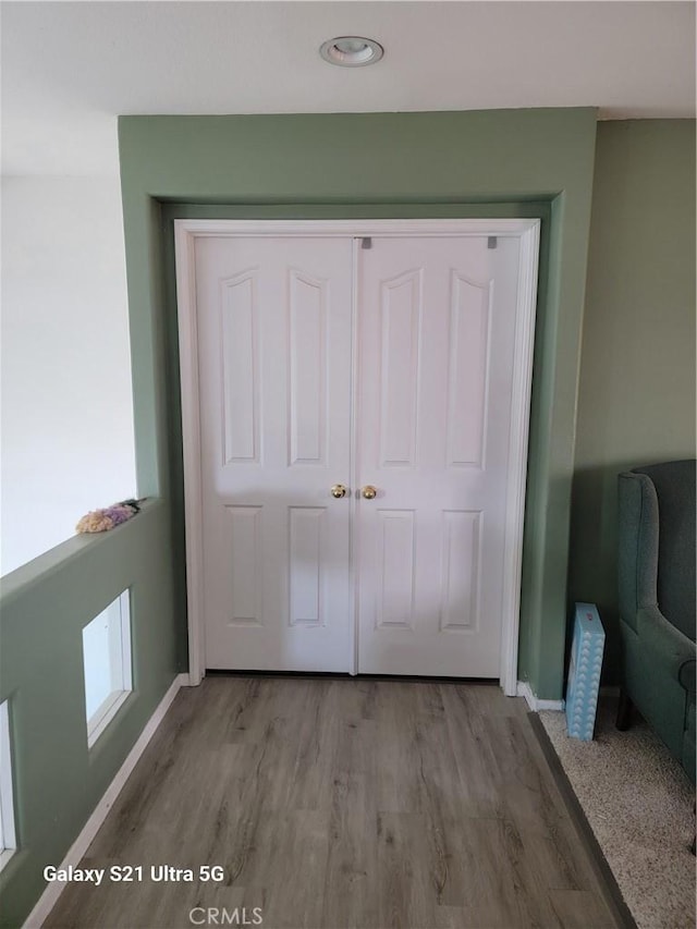 entryway with light hardwood / wood-style flooring