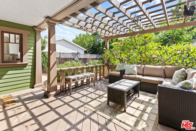 view of patio featuring an outdoor hangout area and a pergola