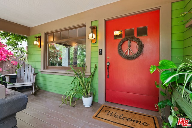 property entrance with a porch