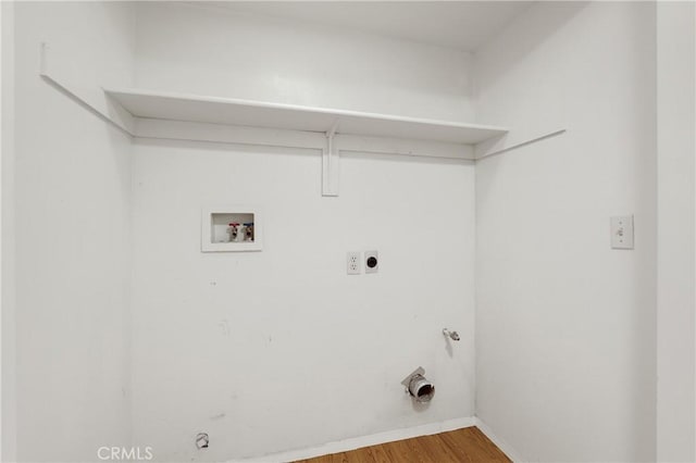 laundry room featuring washer hookup, hardwood / wood-style floors, gas dryer hookup, and electric dryer hookup