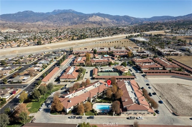 bird's eye view with a mountain view