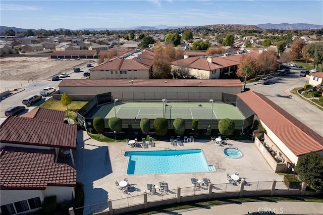 drone / aerial view featuring a mountain view