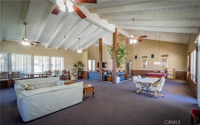 living room with high vaulted ceiling, ceiling fan, beamed ceiling, and dark colored carpet