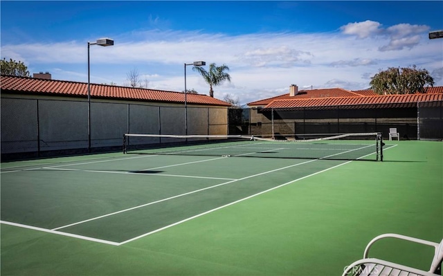 view of tennis court with basketball court