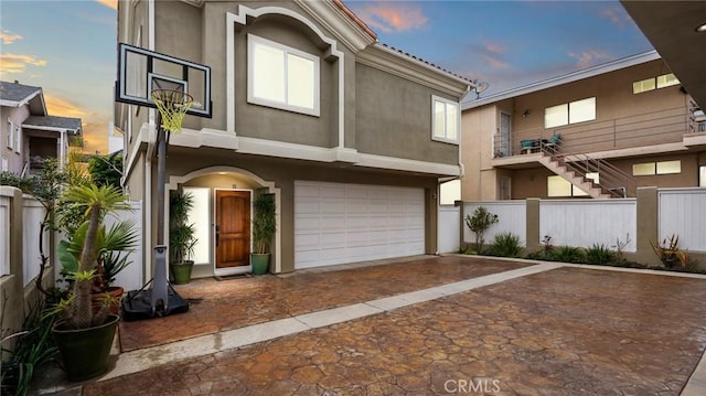 view of front of property with a garage