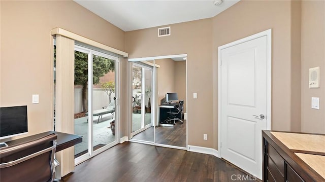 doorway to outside with dark hardwood / wood-style flooring