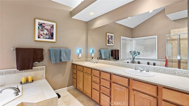 bathroom featuring vanity, vaulted ceiling, tile patterned floors, and shower with separate bathtub