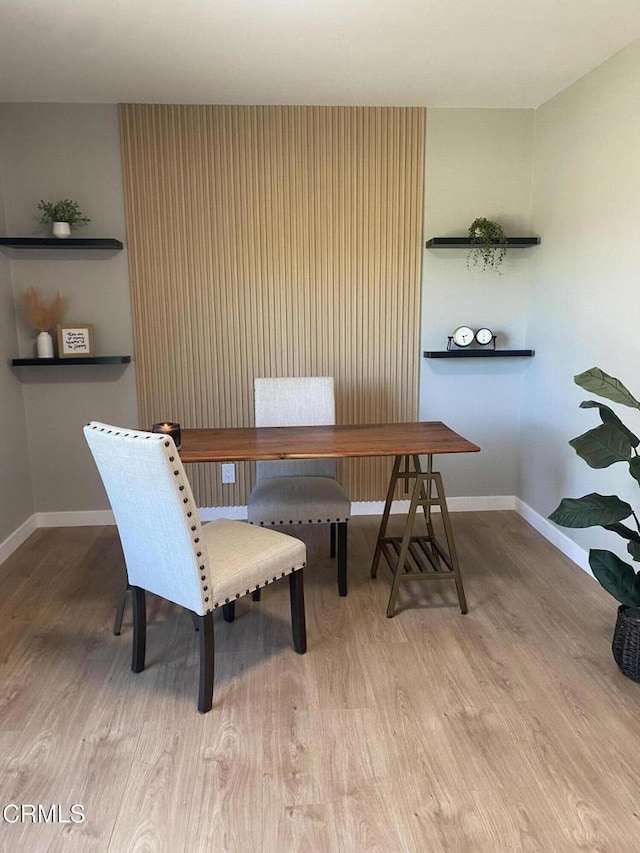 dining room with light hardwood / wood-style floors