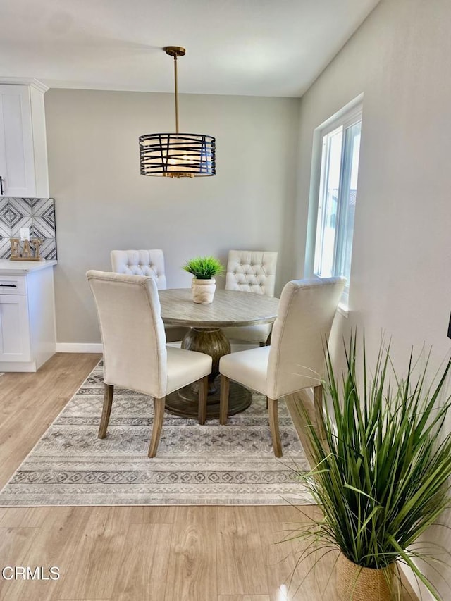 dining room featuring light wood-type flooring