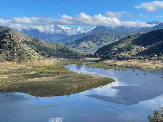 view of property's community with a water and mountain view