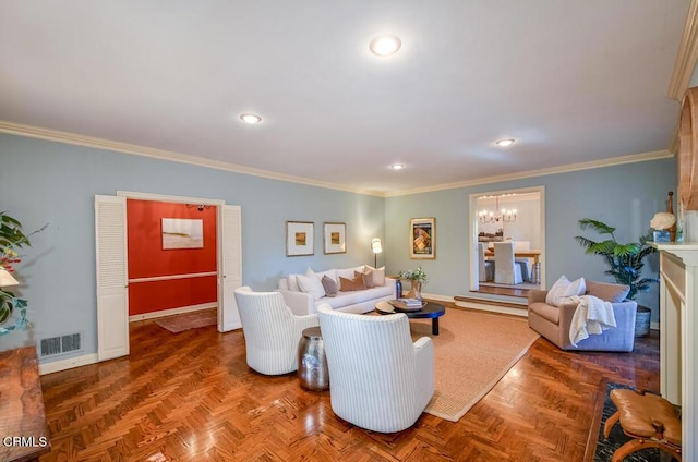 living room featuring ornamental molding, parquet flooring, and an inviting chandelier