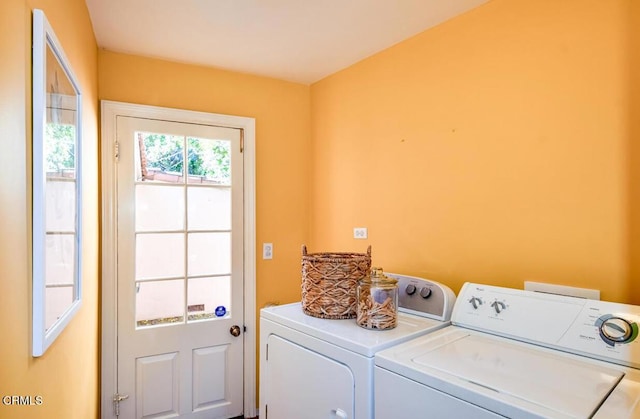 washroom with washer and clothes dryer