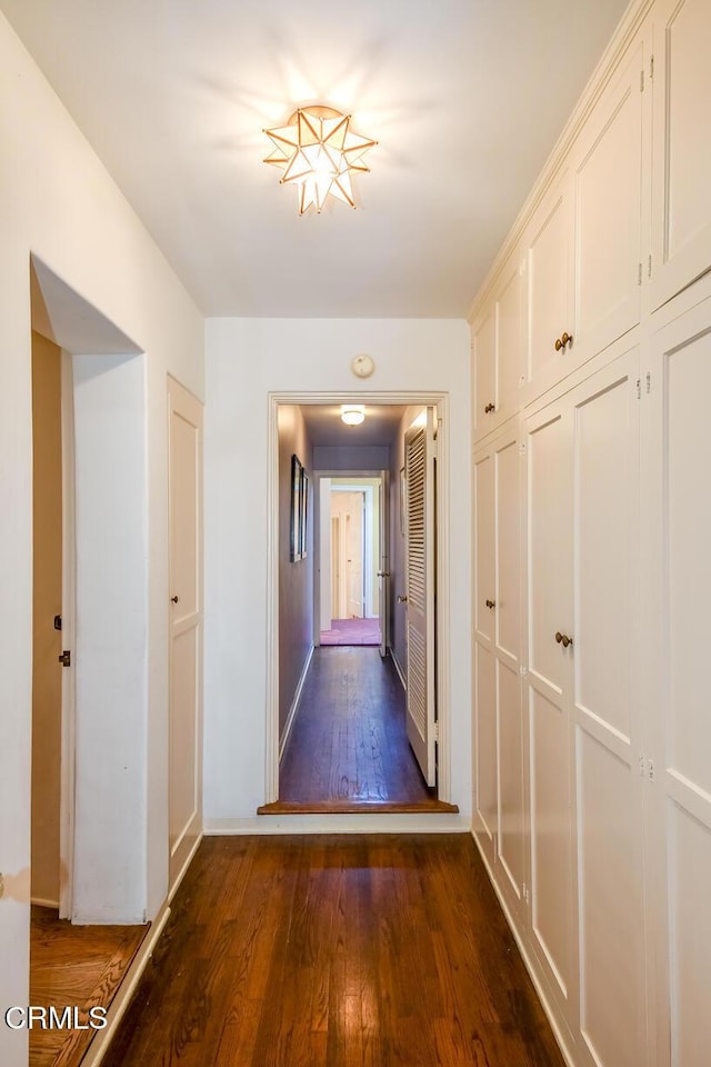 hall featuring dark hardwood / wood-style floors