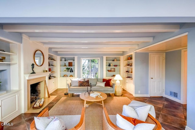 living room featuring built in features and beamed ceiling